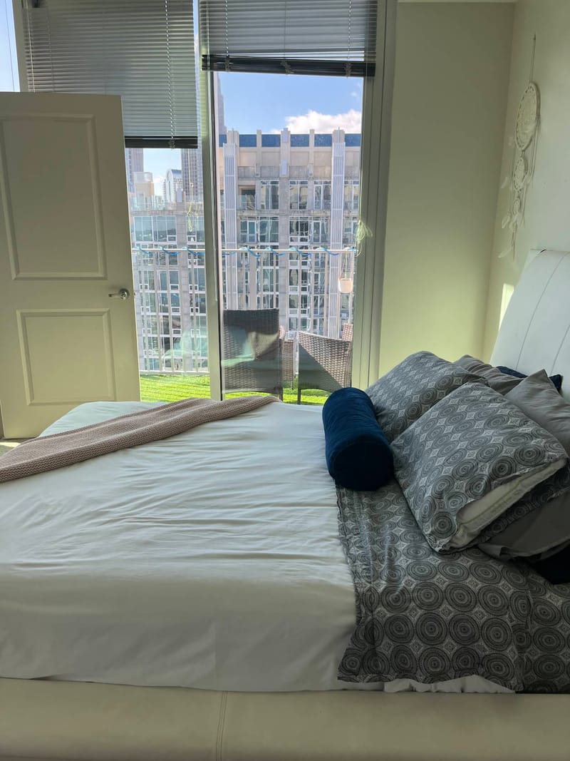 Before cleaning — unmade bed
